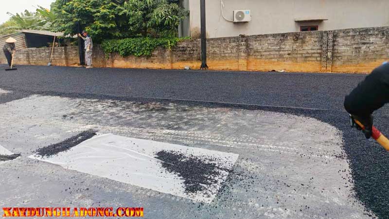 Quy trình thi công rải Asphalt sân đường nội bộ tại Ba Vì